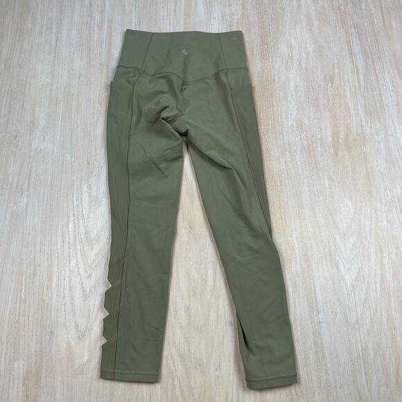 Athleta Salutation Stash Pocket II Laser Cut 7/8 Tight Olive Green Leggings XS - Picture 12 of 16